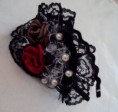 /album/tiaras/tiara-de-renda-preta-com-flores-marrom-e-vermelha-jpg/